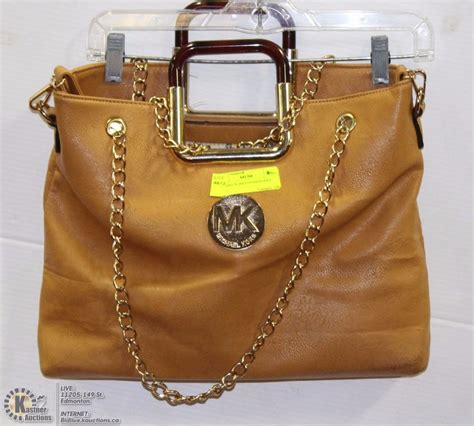 replica michael kors bags online|michael kors bag logo.